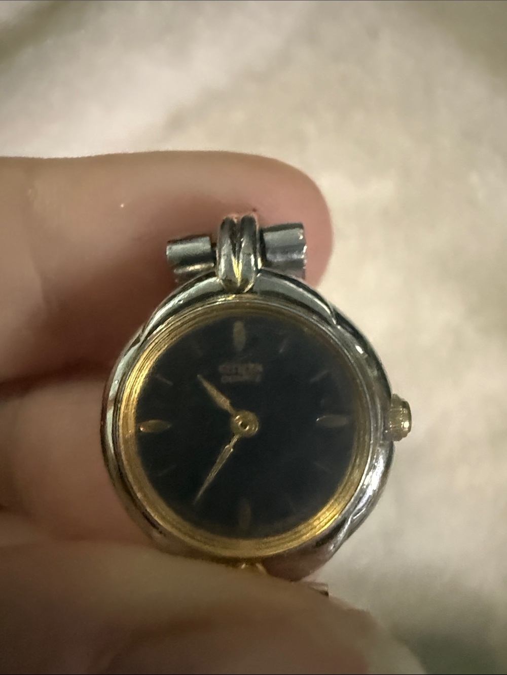 Citizens Of Humanity Two-Tone Pendant Watch in Black and Gold